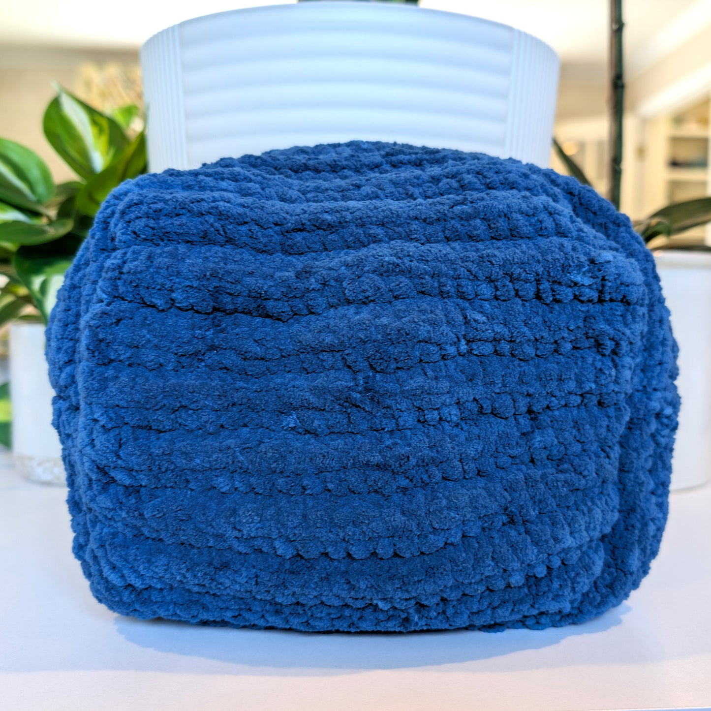 Blue Meridian crochet cosmetic bag with gray ling and zipper
