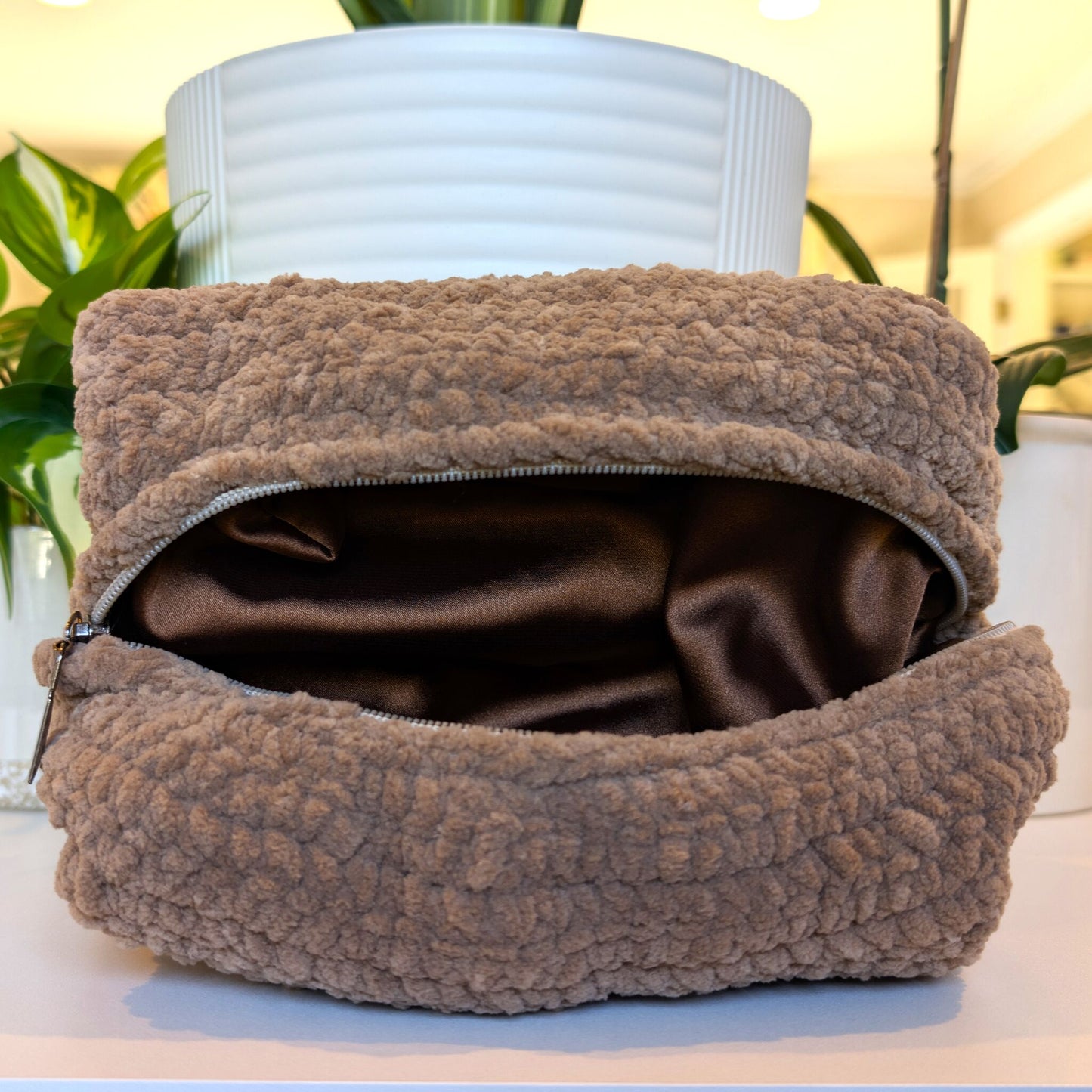 Crocheted mocha colored large cosmetic bag with zipper and brown lining