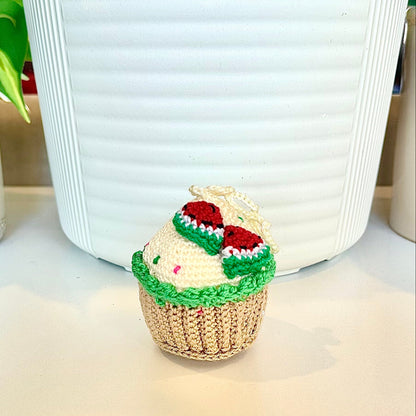 Crocheted watermelon cupcake keychain bag charm with a string 