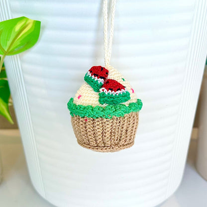 Crocheted watermelon cupcake keychain bag charm with a string 