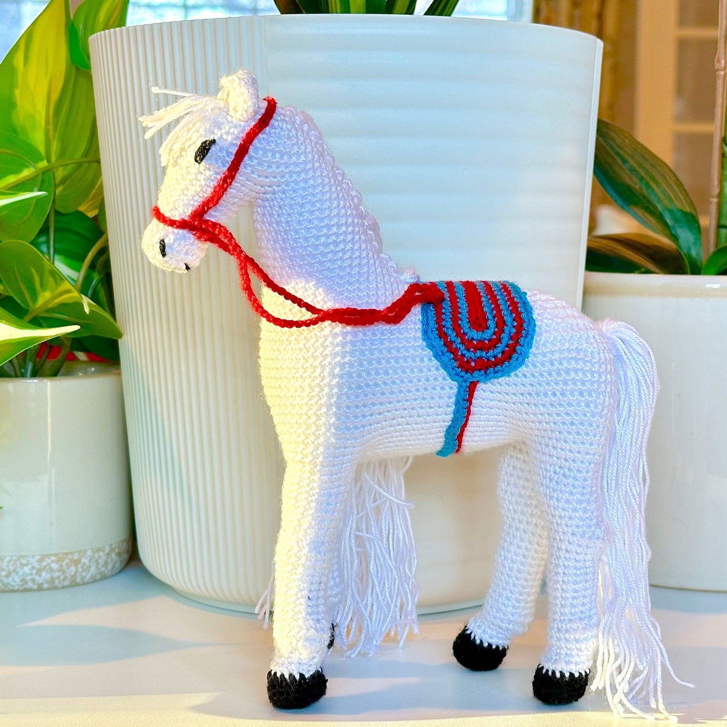 Horse in Striped Saddle