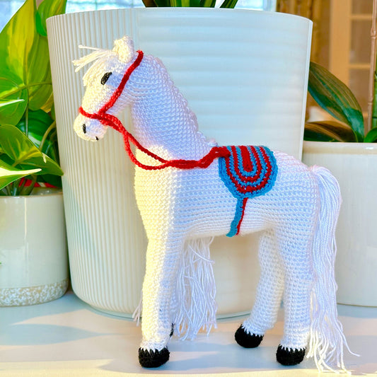 Horse in Striped Saddle