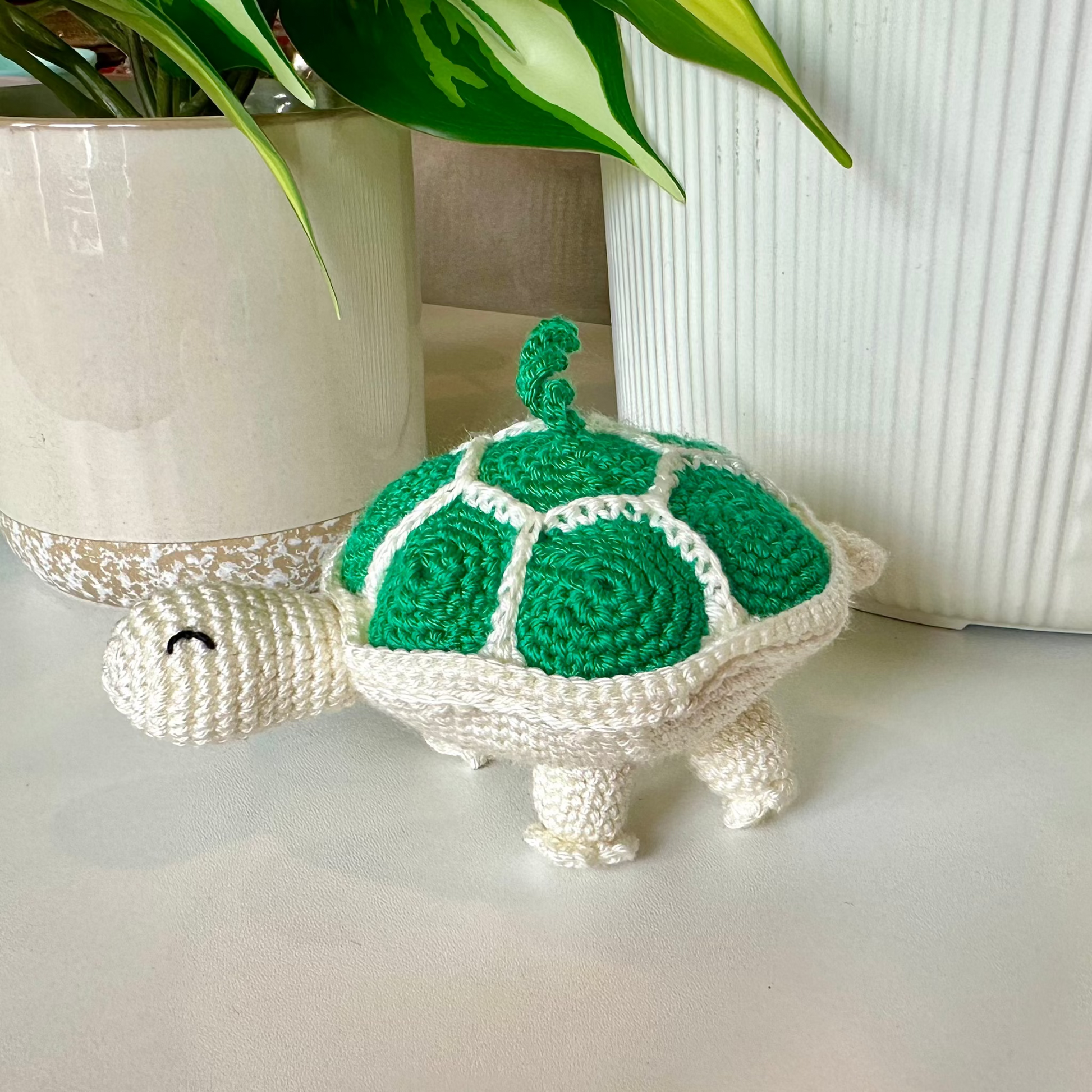 Crocheted turtle charm with green shell