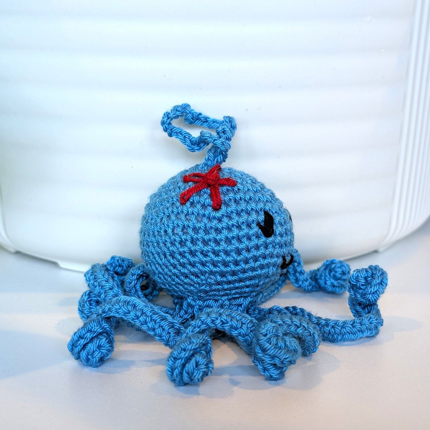 Octopus in Azure with Flower Amigurumi - Handmade Crochet Charm