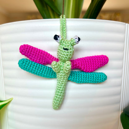 Mini crocheted mint green with hot pink and teal dragonfly charm