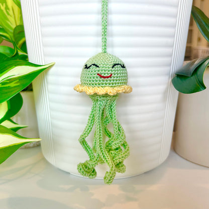 Crocheted mint green jellyfish bag charm with light yellow trim