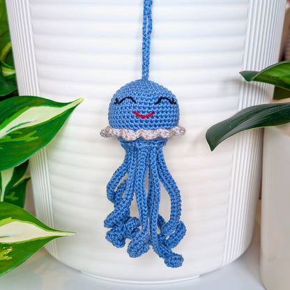 Crocheted steel blue jellyfish bag charm with gray trim