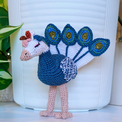 crocheted peacock in Whale Blue with White, Dark Sage, and Olive accents