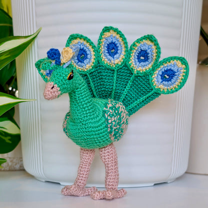 emerald green crocheted peacock with Jade Green, Light Blue, and Creme Brulee colored accents