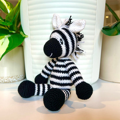 Crochet zebra with black and white stripes and mane