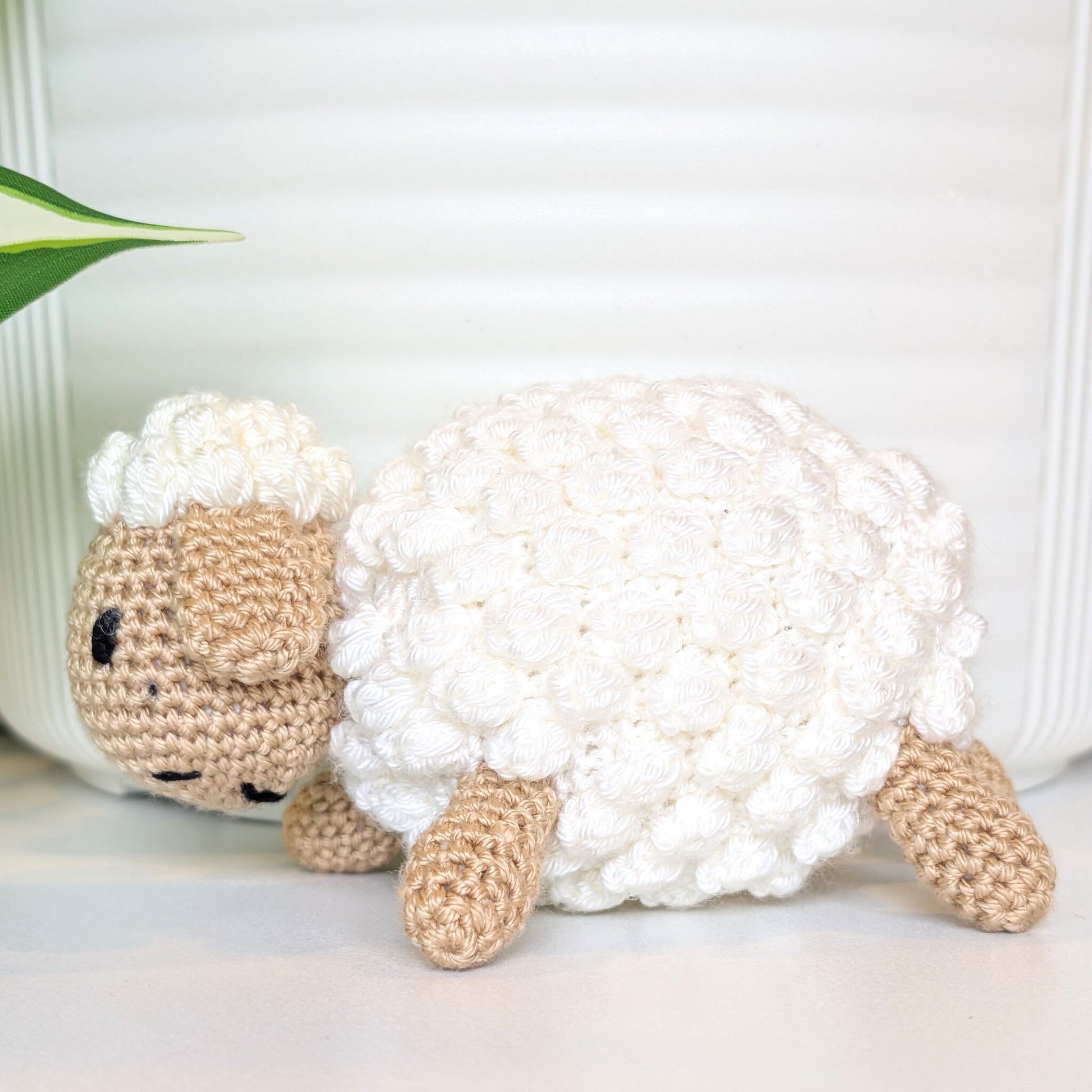 Crocheted sheep plush with beige body