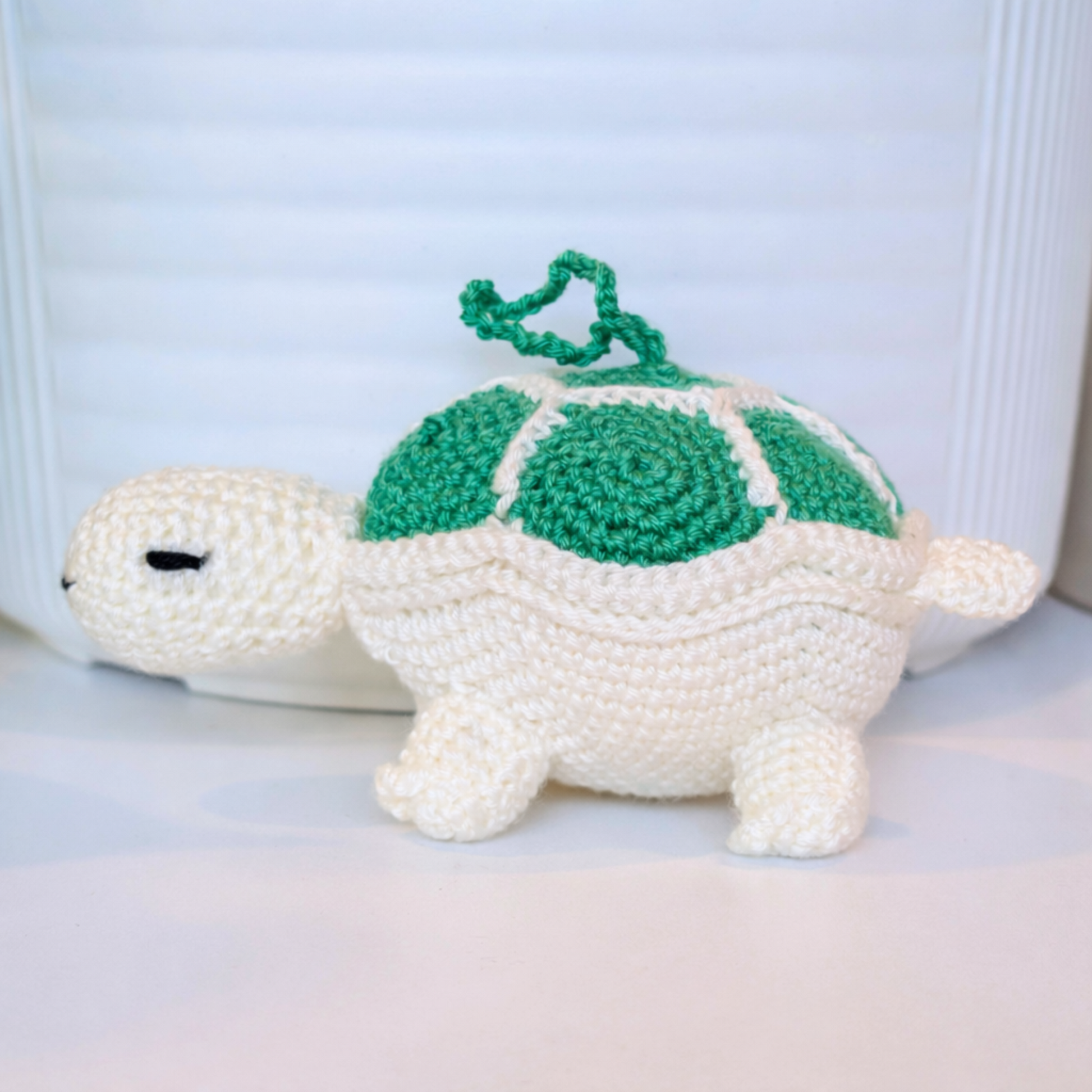 Crocheted turtle charm with green shell